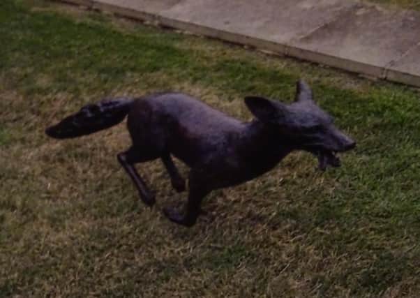 The fox sculpture stolen from Fulbeck. EMN-201021-190746001