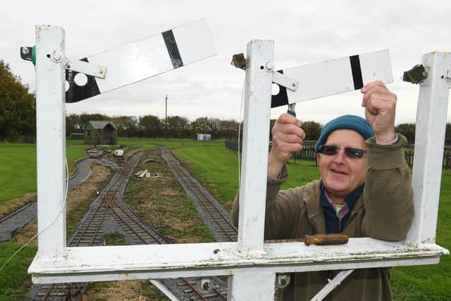 Kevin Dennett adjusting the signal box.