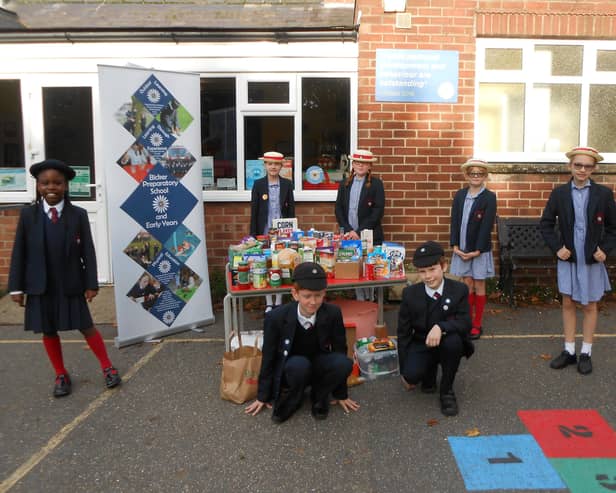Pupils from Bicker Preparatory School and Early Years with items set to be donated to families in need.