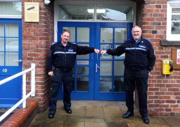 PCSO Wass and PCSO Porter pictured outside Horncastle Police Station.