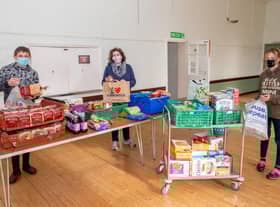 Duke of Edinburgh volunteers from Banovallum - Ben Price and Freya Morton - pictured with Isabel Forrester.