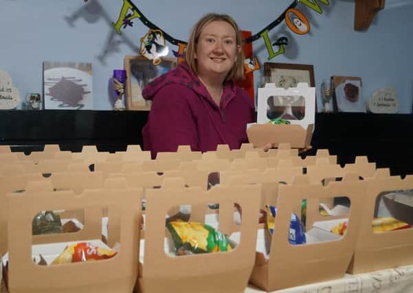 Councillor Nicola Brooksbank with some of the lunch packs