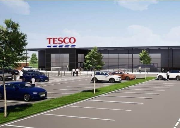An artists impression of what the new Tesco store will look like. EMN-201029-094000001