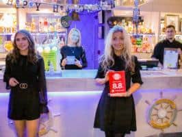Hotel staff with the award