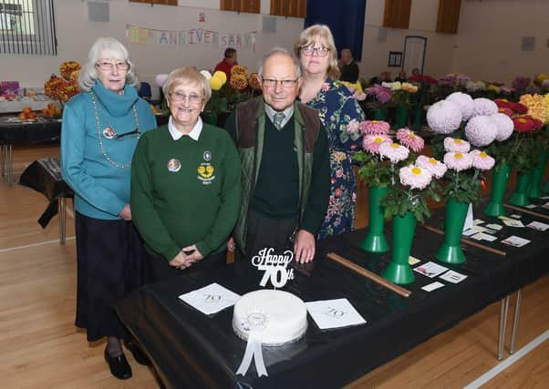 Pictured at last year's 70th Sleaford and District Chrysanthemum Show,  (from left) Mary Snowden - treasurer, Margaret Simpson - secretary, John Simpson - chairman, Annette Sharp - president.