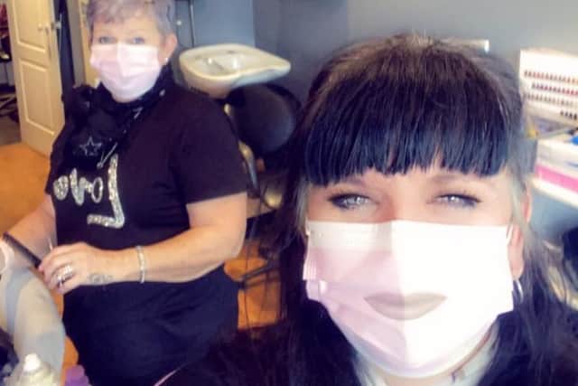 Amanda Flint, owner of Hairs and Graces at Chapel St Leonards, and stylist Verrite Moseley celebrating being open for 14 years.