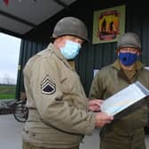 Lee Boden (left) and fellow participant Clive Fletcher planning the route for the fundraising walk.