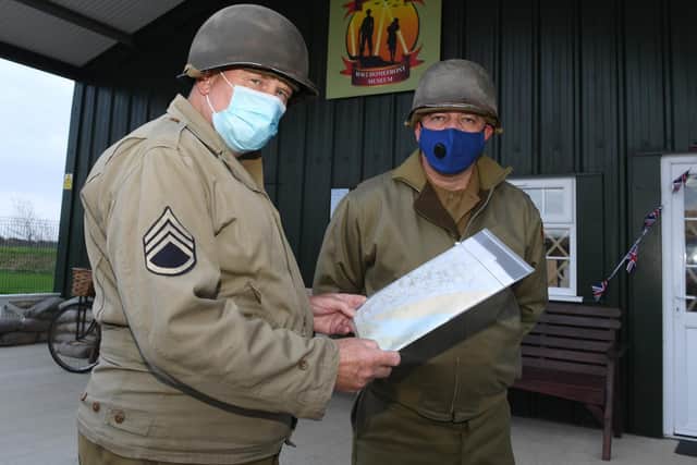 Lee Boden (left) and fellow participant Clive Fletcher planning the route for the fundraising walk.