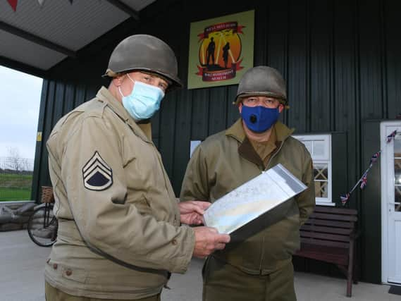 Lee Boden (left) and fellow participant Clive Fletcher planning the route for the fundraising walk.