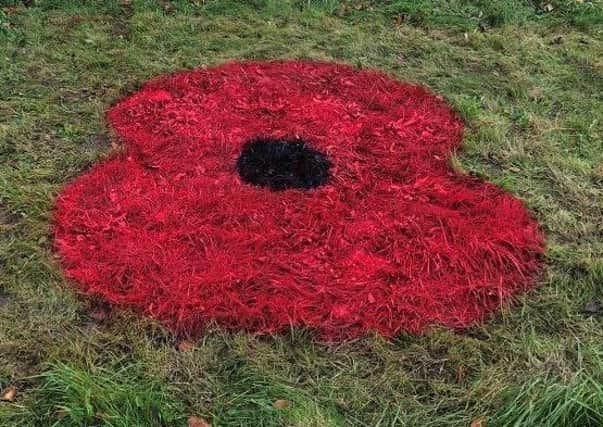 A poppy has been painted onto Gunby Roundabout. EMN-200511-154253001