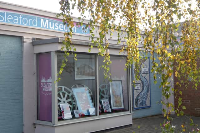 the Remembrance display in Sleaford Museum's front window. EMN-200611-125352001