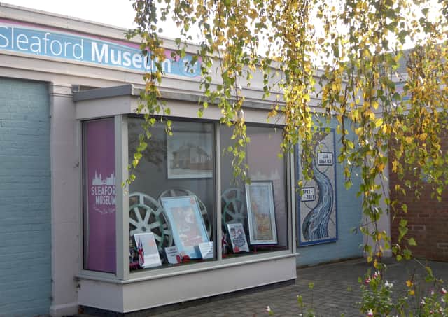 the Remembrance display in Sleaford Museum's front window. EMN-200611-125352001