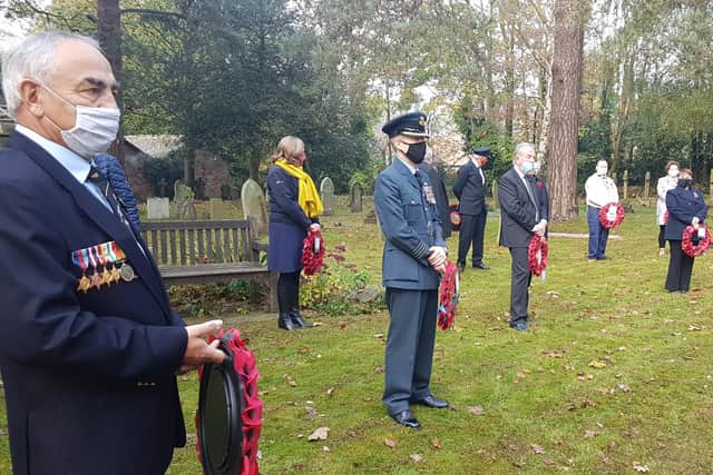 Preparing to place their wreaths at the war memorial in Woodhall Spa