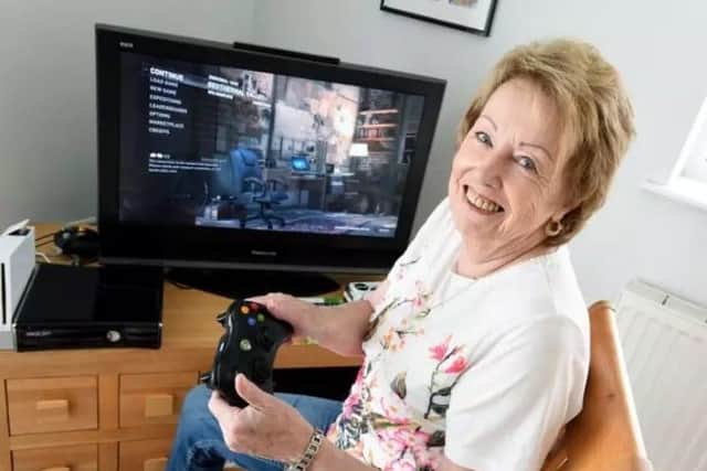 Bridget Odlin, 76, enjoying one of her many video games.