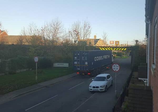 The scene after a lorry collided with the Ermine Street railway bridge at Ancaster five years ago. Photo by Lynsey Hutsby. EMN-151211-163535001