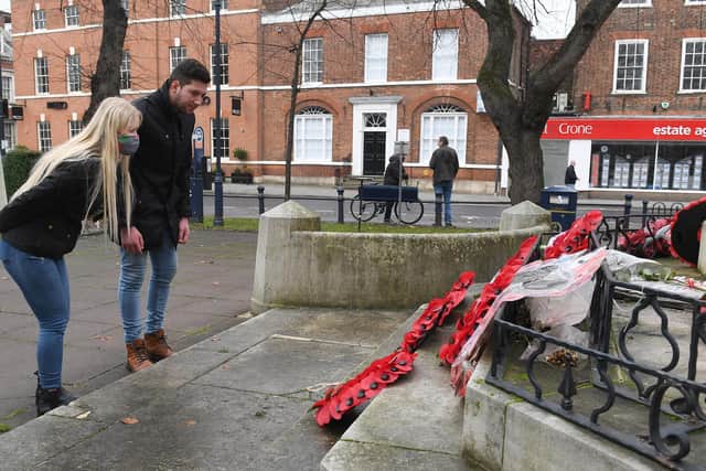 Wreaths were left by families and individuals on Sunday