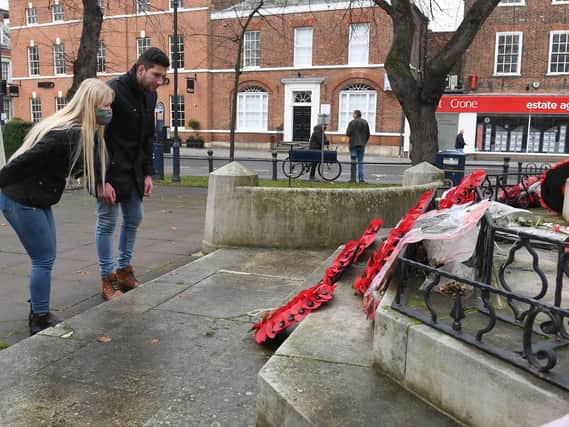 Wreaths were left by families and individuals on Sunday