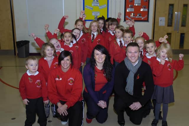 Church Lane Primary school staff and pupils celebrating getting a good Ofsted report.
Pupils with L-R Emily Dix - PE teacher, Helen Fulcher - Headteacher, Matt O'Halloran - School Bursar.