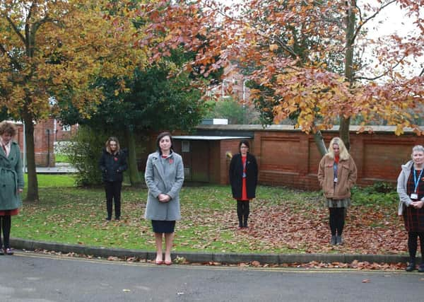 Veterans Team observing the two-minute silence