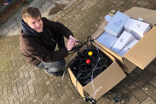 Will Bunney gets the job of checking the bulbs