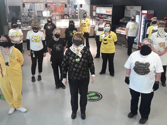 Staff at Asda dressed up for Children in Need
