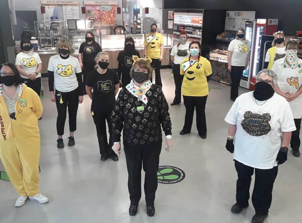 Staff at Asda dressed up for Children in Need