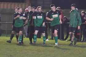 Sam Jackson, left, celebrates a Sleaford goal against Boston last season.