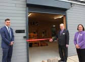 Chairman of the governors Graham Arnold opens the new facility, alongside academy principal Laranya Caslin and teacher Tom Mitchell.