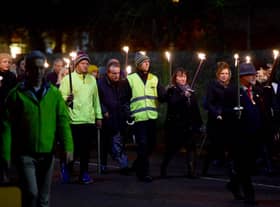 Richard Pullen in last year's torchlit procession. EMN-201118-182416001