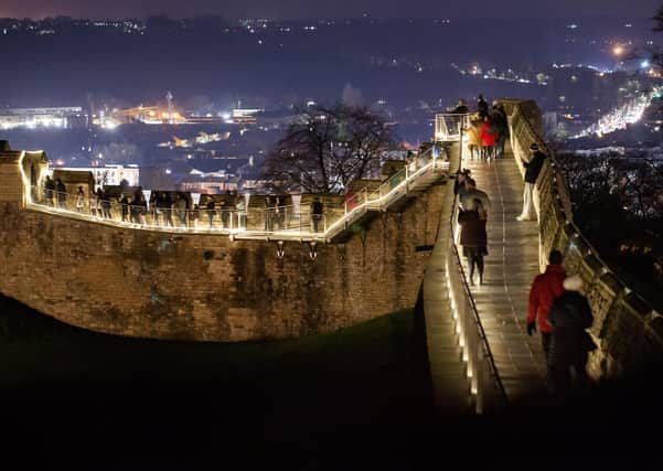 Lincoln Castle's illuminated wall walk in 2019. In 2020 it will have social distancing guidelines in place. EMN-201120-102401001