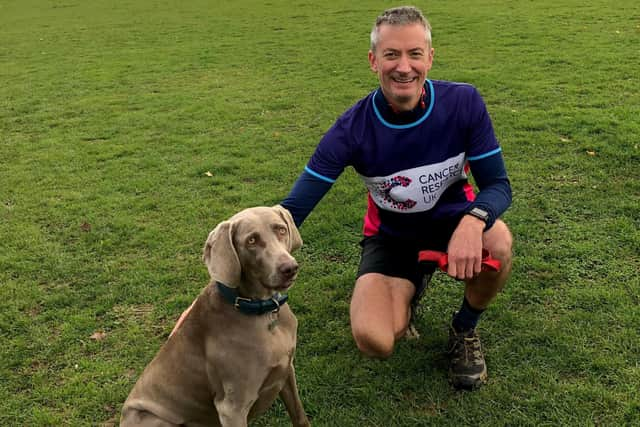 Paul Moss with his dog Ivy. EMN-201120-170027001