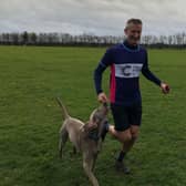 Paul Moss running with his dog Ivy. EMN-201120-170039001