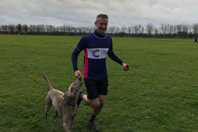 Paul Moss running with his dog Ivy. EMN-201120-170039001