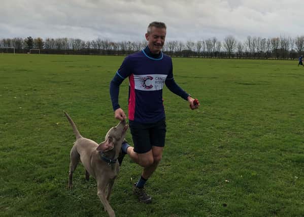 Paul Moss running with his dog Ivy. EMN-201120-170039001