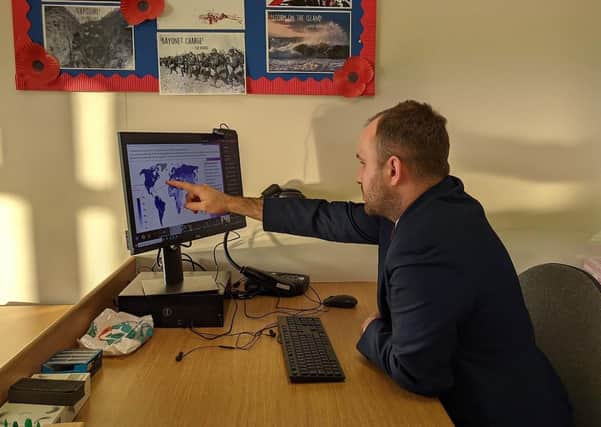 Oliver Thompson, Curriculum Leader for Humanities at Somercotes Academy, delivering a remote Geography lesson to students. This photo was taken in November 2020 while some Year 10 students were self-isolating.