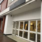 Signs something is happening can be seen through the entrance of the former Beales Department store.