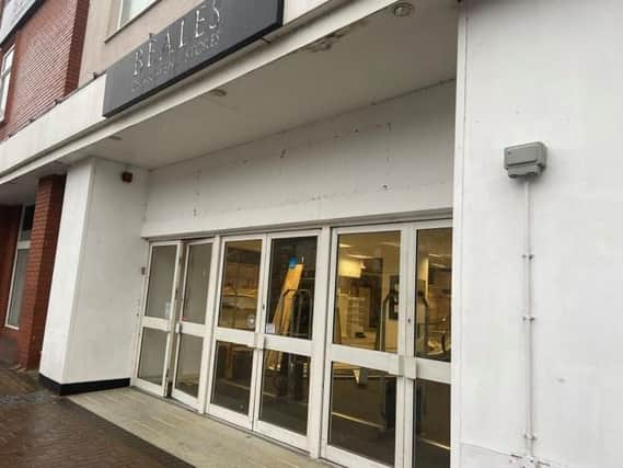 Signs something is happening can be seen through the entrance of the former Beales Department store.