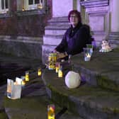 Illuminated lantern festival in Boston, celebrating 400th anniversary of the Pilgrim story.  Trustee and volunteer at Fydell House Sue Morrison, with lanterns at Fydell House. EMN-201127-130521005