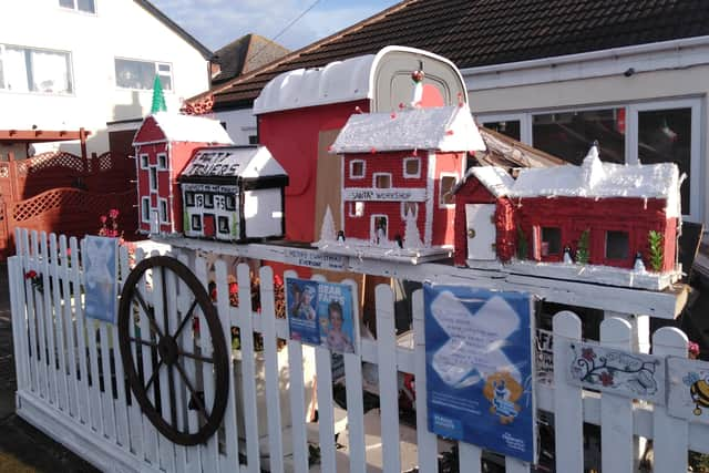 Some of Patrick's wooden houses.