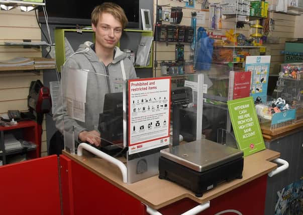 A second post office counter has been installed at Pop-In Bargains to handle the Christmas demand. Pictured - Lee Taylor - post master. EMN-200112-160739001