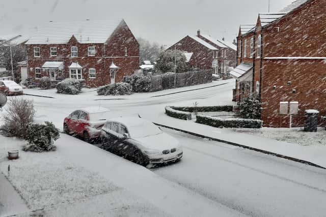 Snow is falling and settling fast on quieter roads and pavements, potentially creating slippery conditions for drivers and pedestrians in Sleaford area.