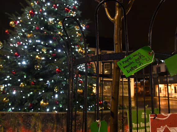 A Christmas wish on a label tied to railings near the Christmas tree in Louth.