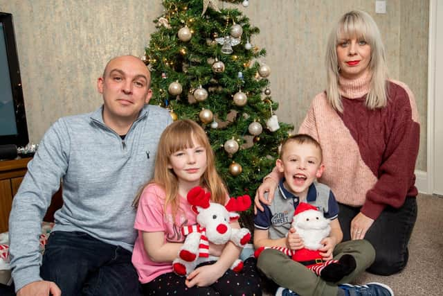 Will pictured with dad Adam, mum Sam and sister Neave.