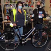 Janet Brummit, left, with sister Sally Hughes and the new bike she has picked out thanks to locals Christmas spirit. EMN-200712-143054001