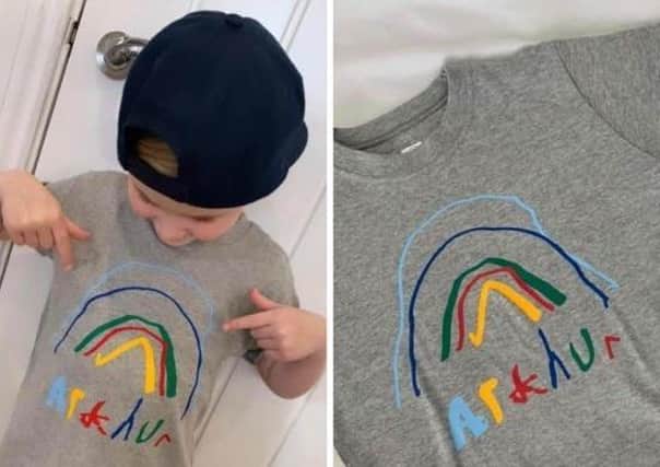 Arthur (5) with one of his rainbow t-shirts, which he designed earlier this year.