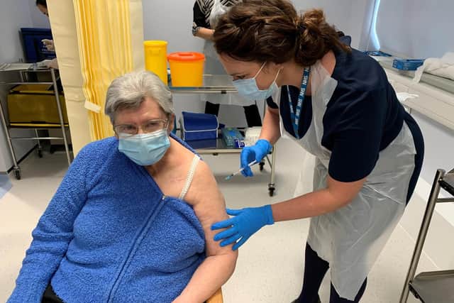 Janet Judson receives her vaccination