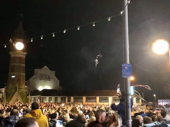 Hundreds of people crowded together around the Clock Tower to welcome in 2020 - what a difference a year makes.