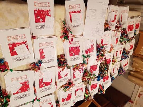 Jingle bells and song sheets are being delivered to every resident.