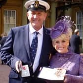 Ray Chapman pictured with Dame Barbara Windsor when he received his MBE.