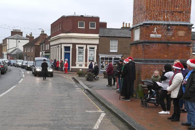 Members of the community lined the streets to pay tribute to their Santa, Wally' Ernest Parnham, who died last month.
